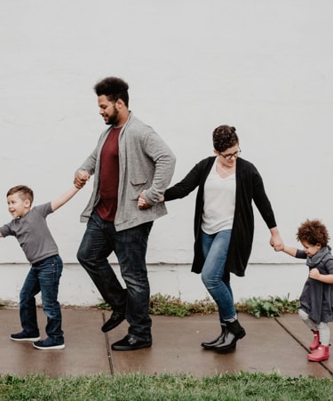 Family walking hand in hand